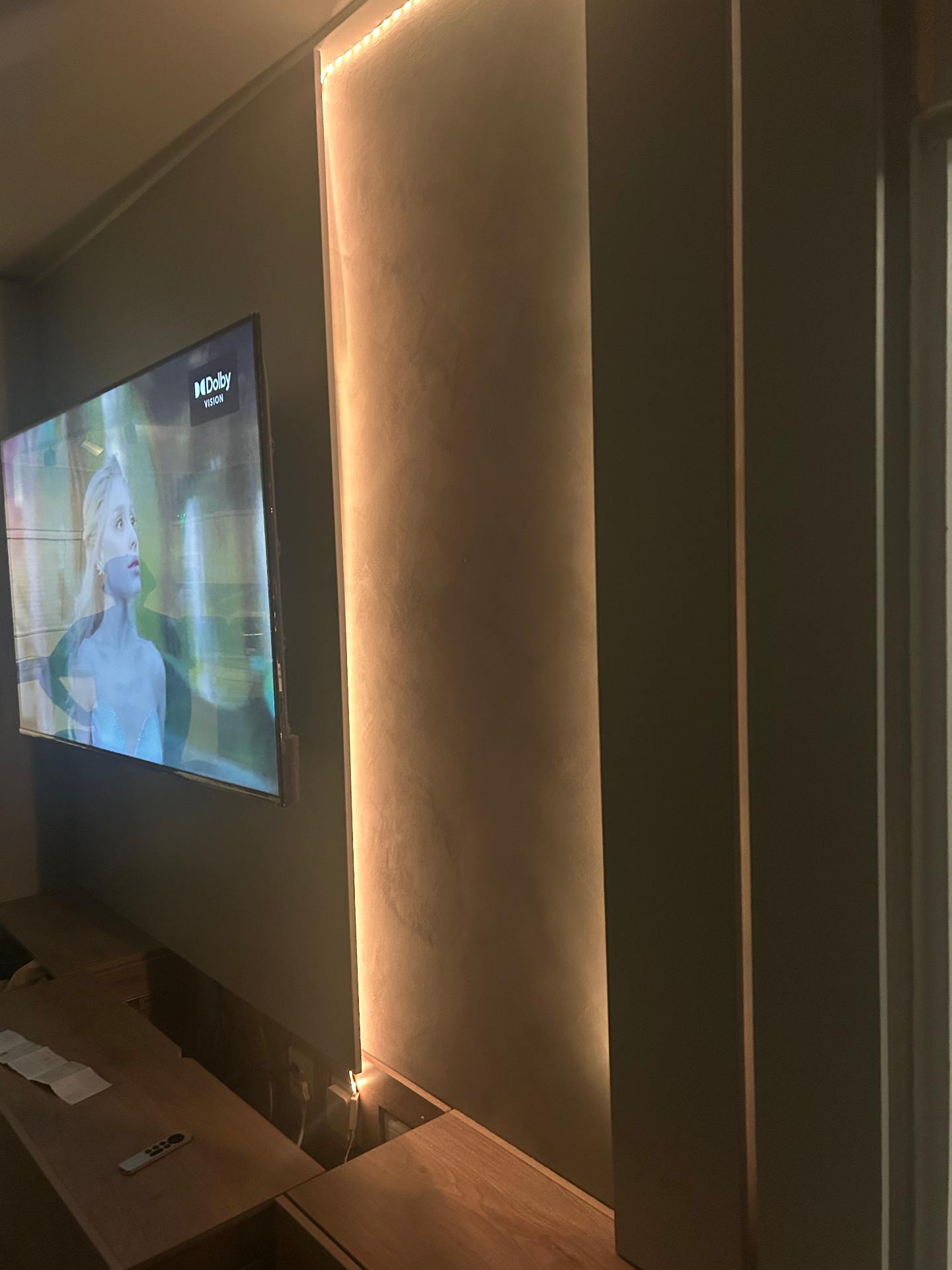 Close view of polished plaster alcove with warm concealed lighting