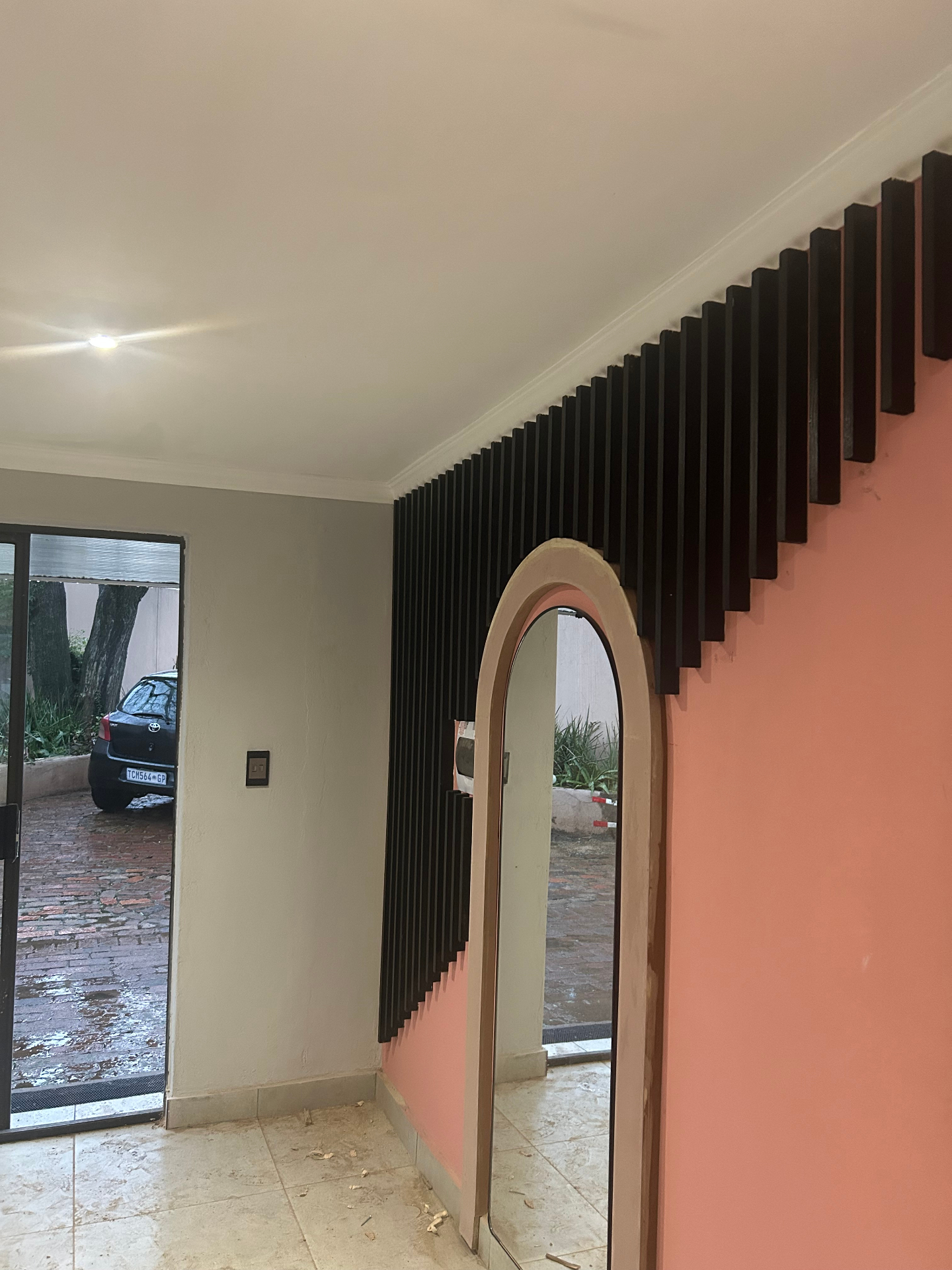 Slatted arch entry at Hair Vine
