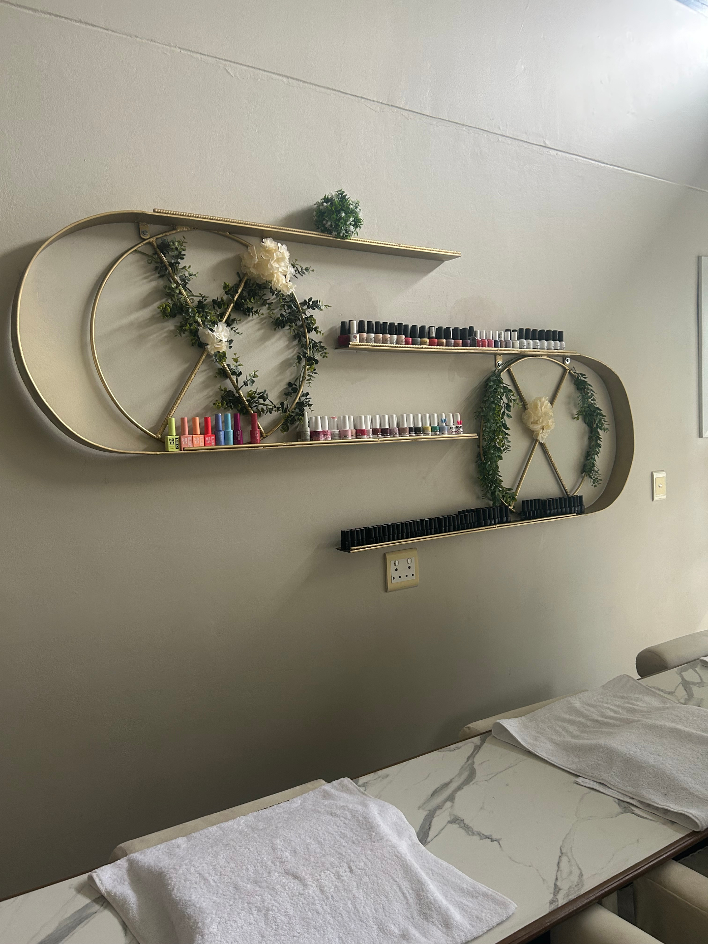 Brass display wall at Amaris Spa